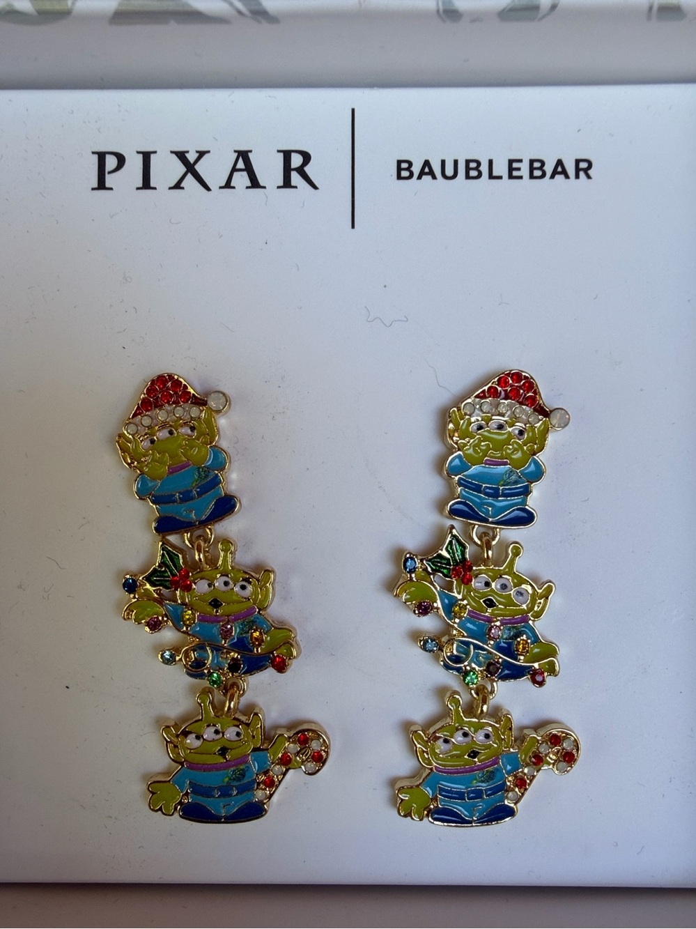 BaubleBar Pixar Green Alien Drop Earrings with Red and Blue Accents NIB